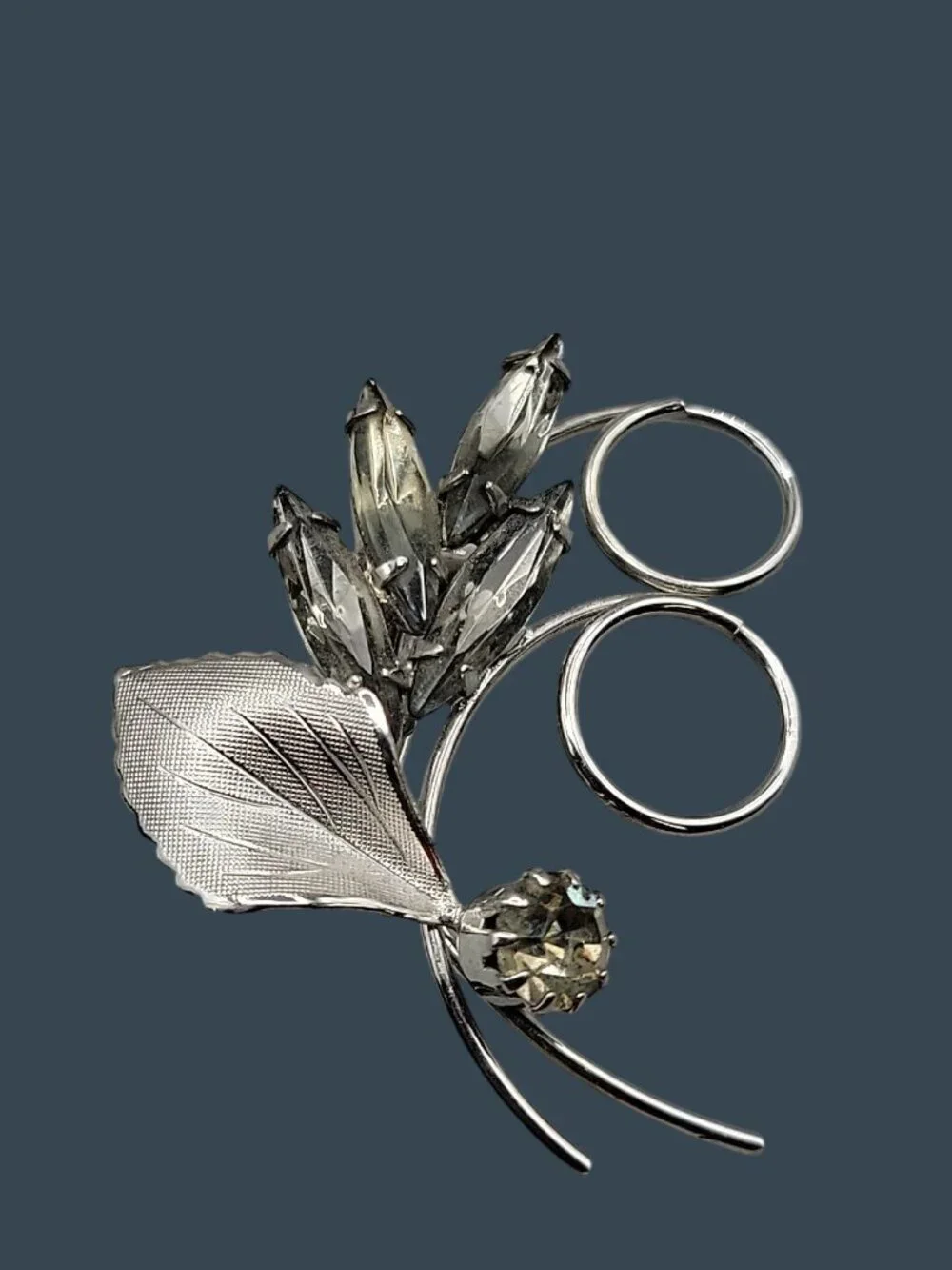 Vintage Smokey Rhinestone Floral Spray Brooch Polished Silver Tone Curls & Leaf